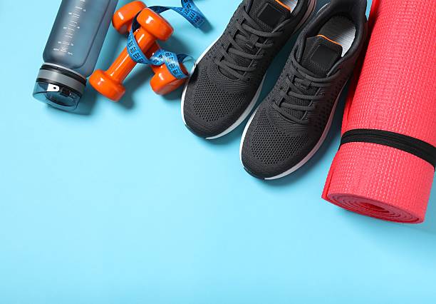 istock Sport equipment on blue background, top view 2247353578