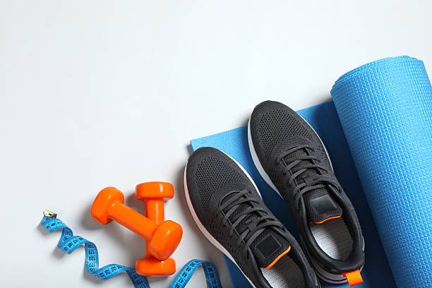 istock Flat lay of sport equipment on grey background 2247353648