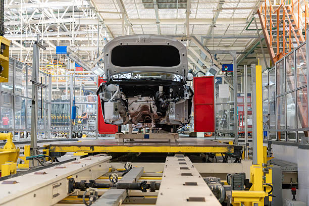 istock A modern, high-tech automotive assembly line with a white car body chassis 2247358769