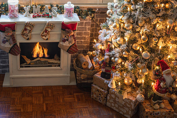 istock Decorated Christmas Tree Near Fireplace 2247361859