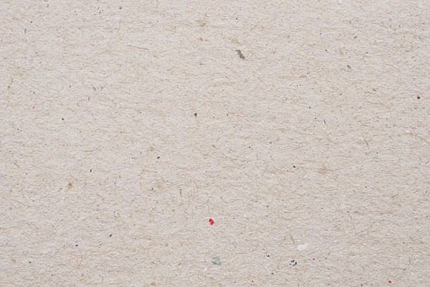 istock Old brown recycle cardboard kraft paper texture background 2247369302