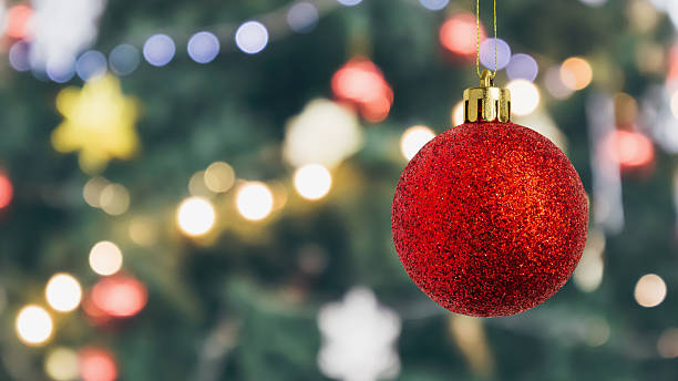 istock Christmas ball bauble hanging decoration with bokeh light background 2247369802