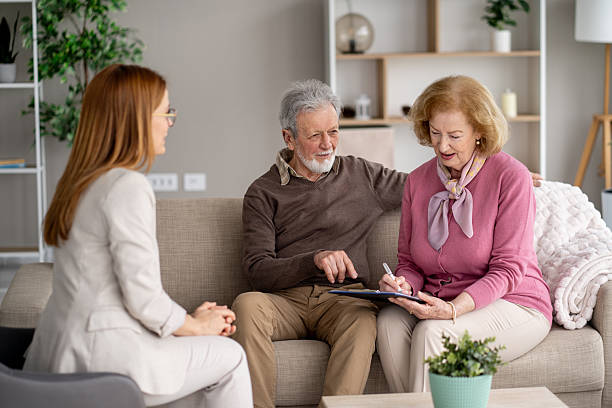 istock Warm interaction between elderly couple and their caregiver 2247371021