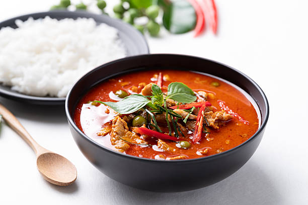 Thai red curry with pork and cooked rice