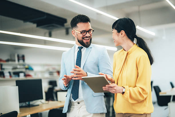 istock Business colleagues talking in the office 2247374861