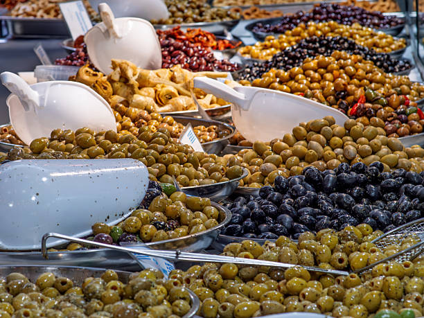 istock Vibrant Display of Fresh Olives at Market 2247376956