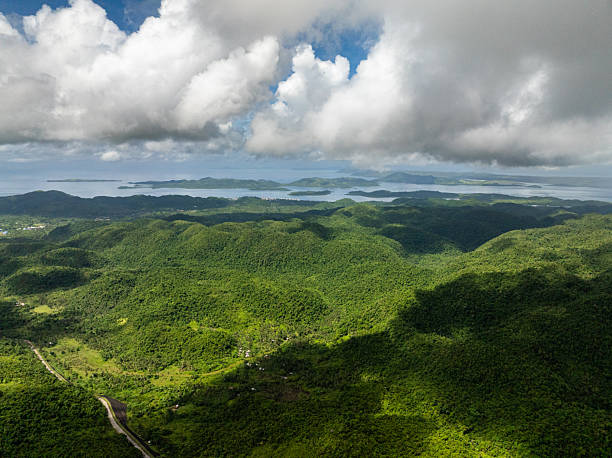 istock Green mountain landscape with cloudy sky. Siargao, Philippines. 2247378581