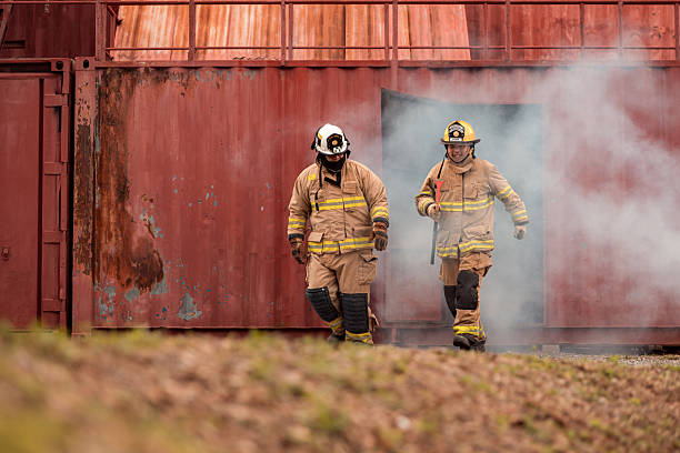istock Firefighters in full protective gear participate in a training exercise outside 2247381074