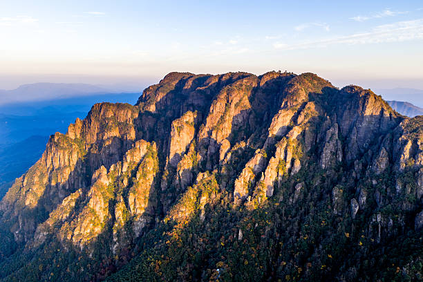 Sunset, granite mountains and autumn scenery