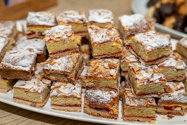 istock Almond raspberry dissert squares on a party tray 2247385958