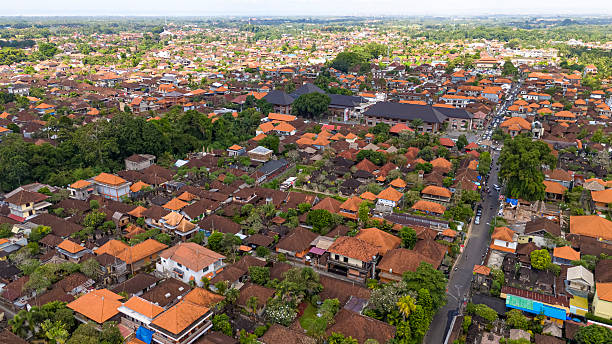 istock Aerial View of Dense Ubud Town Orange Roofs 2247388736