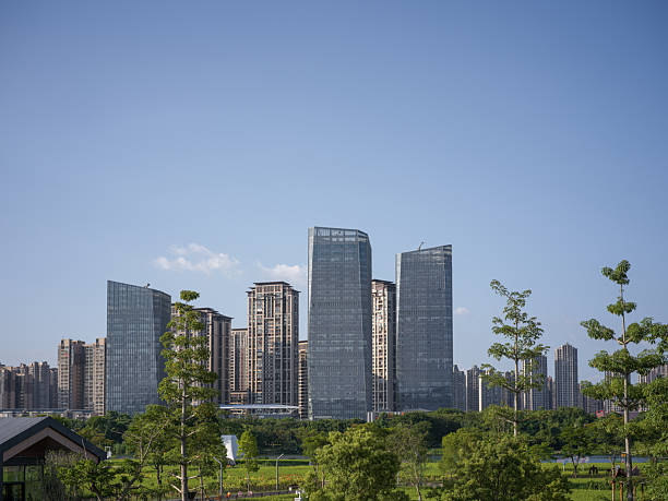 istock Modern Skyscrapers and Urban Skyline Against a Clear Blue Sky 2247389224