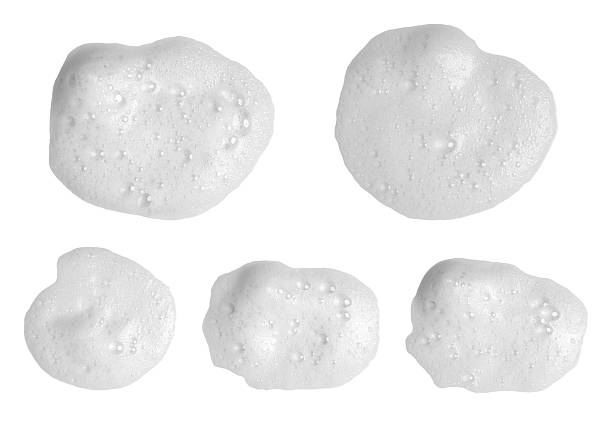 istock White foam texture in various smear shapes for skincare, soap, cleansing products, and cosmetic presentation, highlighting bubbles, softness, and clean beauty design for product visuals. 2247390607