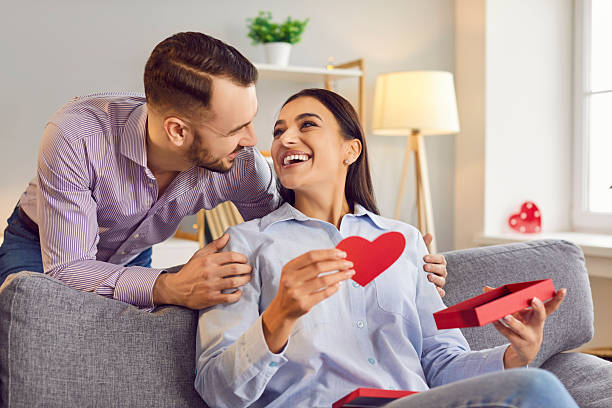 istock Loving Couple Celebrating Valentine Day With Gift 2247391896