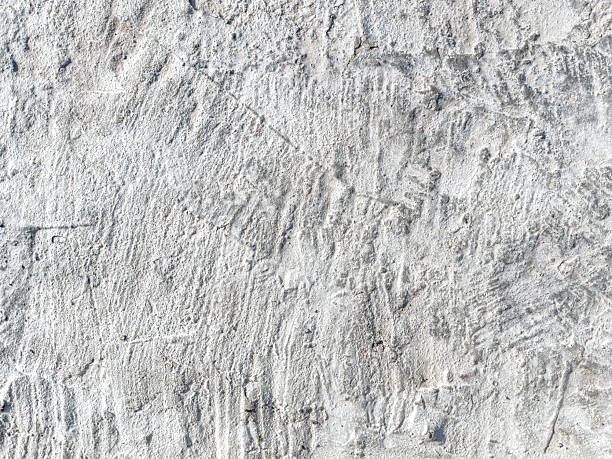 istock grey concrete rough texture. weathered cement floor or wall background. 2247392032