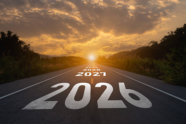 istock Road Leading Towards Future Years from 2021 to 2026 under Dramatic Sky at Sunset, Symbolizing Time and Progress in Life Journey 2247392482