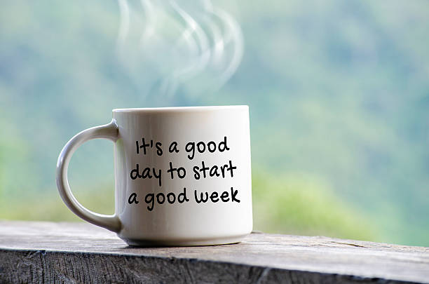istock It is a good day to start a good week text on a mug with nature beauty background. 2247393011