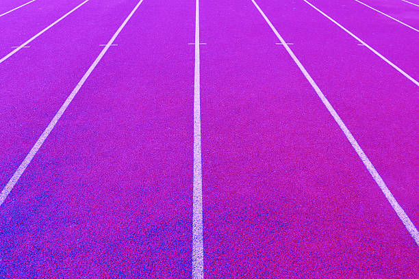 close up red running track, sports court or playground background with white line.