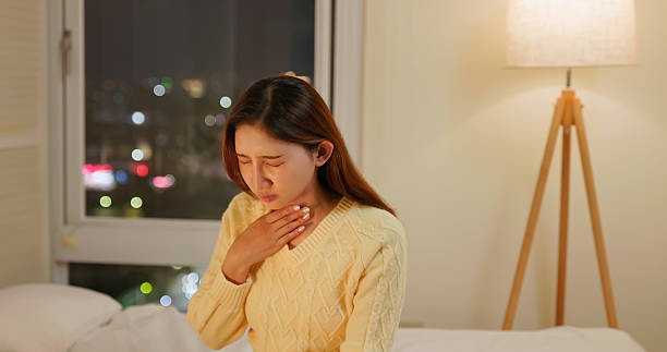 istock Asian female get cold sore throat home 2247395254