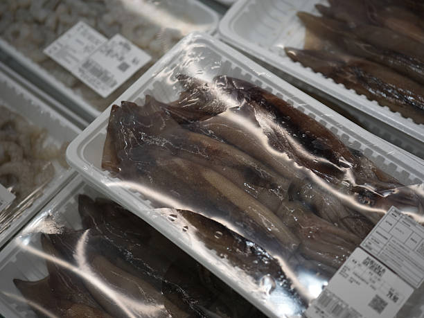 istock Packaged Squid Displayed in the Refrigerated Section of a Supermarket 2247397092