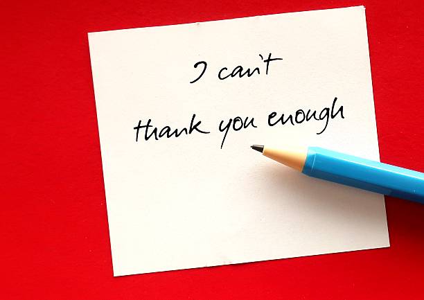 istock Note written - I can't thank you enough - appreciative way to express gratitude for effort and support  from friends, co-worker colleague or team staff employee - to say thanks for their help 2247406591