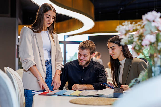istock Design team collaborating on fabric swatches for interior project 2247412957