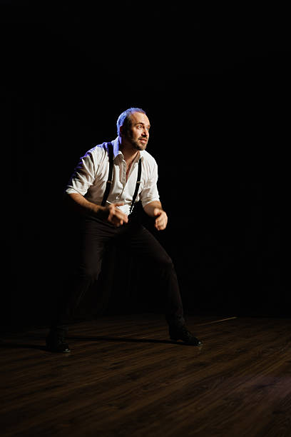 Two actors performing on stage