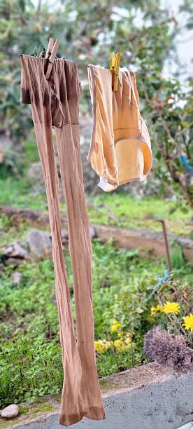 istock Drying Hosiery on Clothesline Outdoors 2247423285