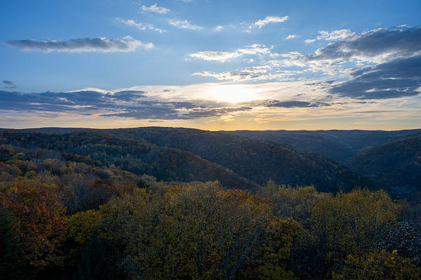 istock A Breathtaking Autumn Sunset Over Rolling Forested Hills 2247423306