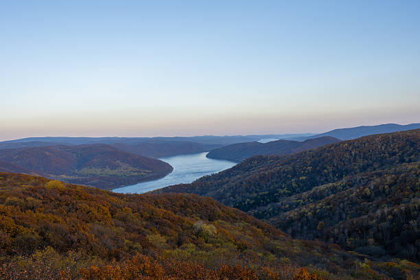 istock A Winding River Through Autumn Hills at Dusk 2247423343