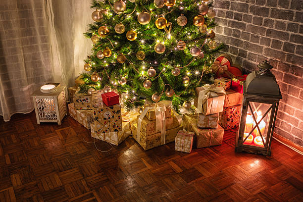 istock Wrapped presents under the Christmas tree 2247429060