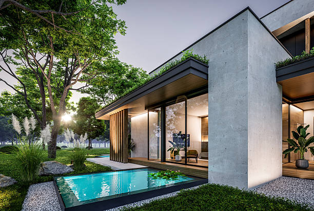 istock 3d rendering of two-story house with concrete facade in evening 2247432905