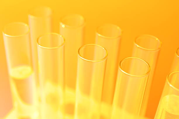 Close up of red, orange and green pipettes