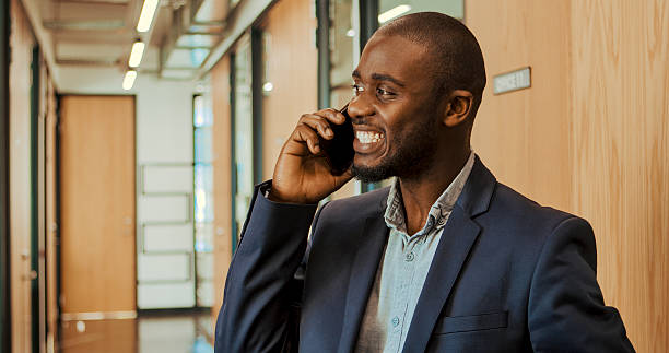 istock Laughing, talking and a man on a phone call . 2247435906