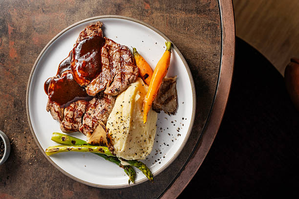 Steak, Dinner, Mashed Potatoes, Prepared Potato, Meat, Asparagus, Carrot, Steak Dinner, Food and drink, Food, Vegetable, Plate, High Angle View, Sauce