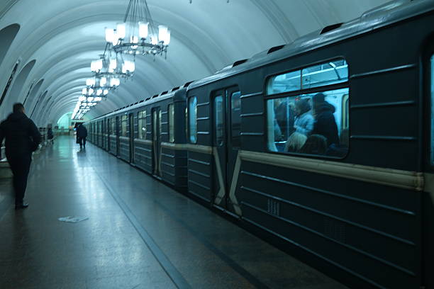 Subway train ready to depart from the station, doors closed, metro station, lightening, public transport