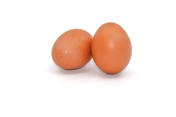 Eggs on a white background are a good source of protein. which helps build and repair worn out parts of the body.