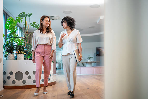istock Diverse Business Professionals in Office Walkway 2247449660