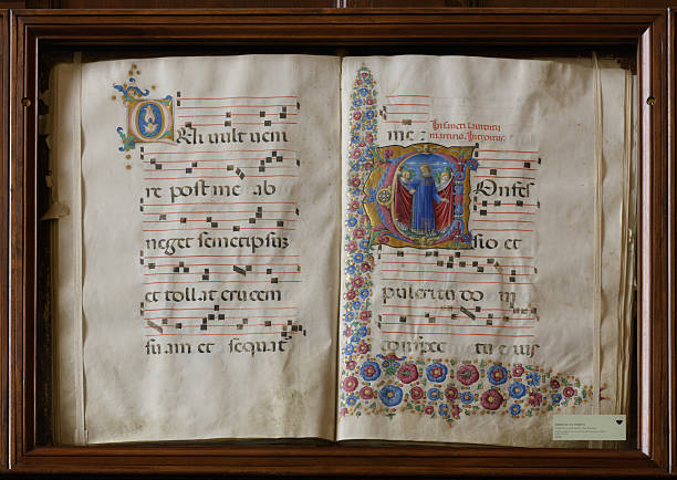 istock Illuminated manuscript page with musical notation - Libreria Piccolomini - Duomo di Siena (Siena Cathedral), Italy 2247449764