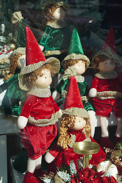 istock Christmas dolls. Christmas decorations. Xmas holiday pattern. Christmas greeting card. Decorative color art. Xmas Background design. Invitation, greeting banner. Christmas and New Year celebration. 2247454943
