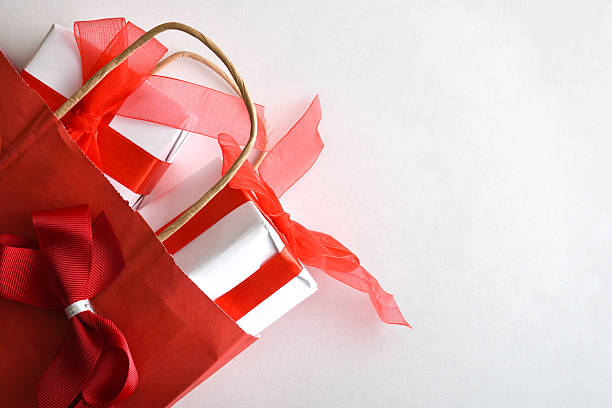istock Gift concept featuring a red shopping bag with gifts 2247457384