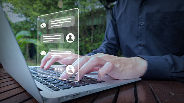 istock Chatbot Interface on Laptop in Outdoor Workspace with Natural Background 2247457566