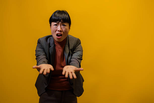 istock Confused Japanese woman reacting dramatically 2247463176