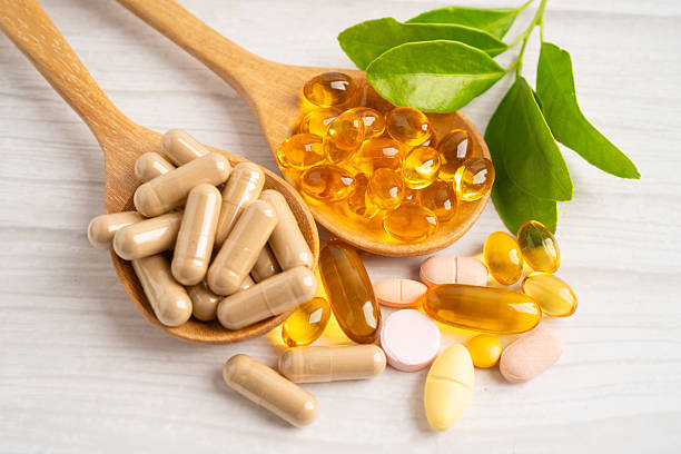 istock Alternative medicine herbal organic capsule drug herb. 2247465047