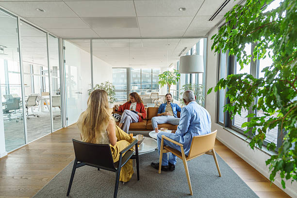 istock Diverse Team Engaging in Relaxed Lunch Break Within Modern Corporate Office 2247465795