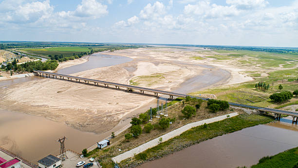 istock The meandering river on the vast grassland 2247466000