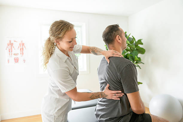 istock Modern rehabilitation physiotherapy woman with man client 2247467542