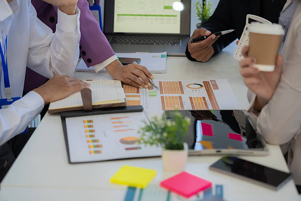 istock Business teams analyze financial data and charts together on digital tablets and laptops and digital tablets to plan investment projects. 2247468748