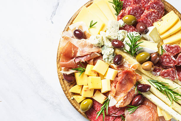istock Antipasto platter with jamon, salammi and cheese assortment. 2247468973
