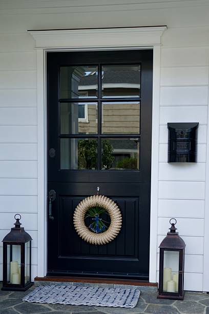 istock Traditional farmhouse with black Dutch door 2247471906